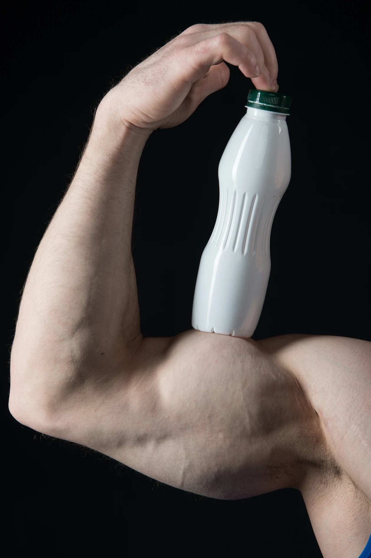 Male hand of muscular man with biceps, triceps